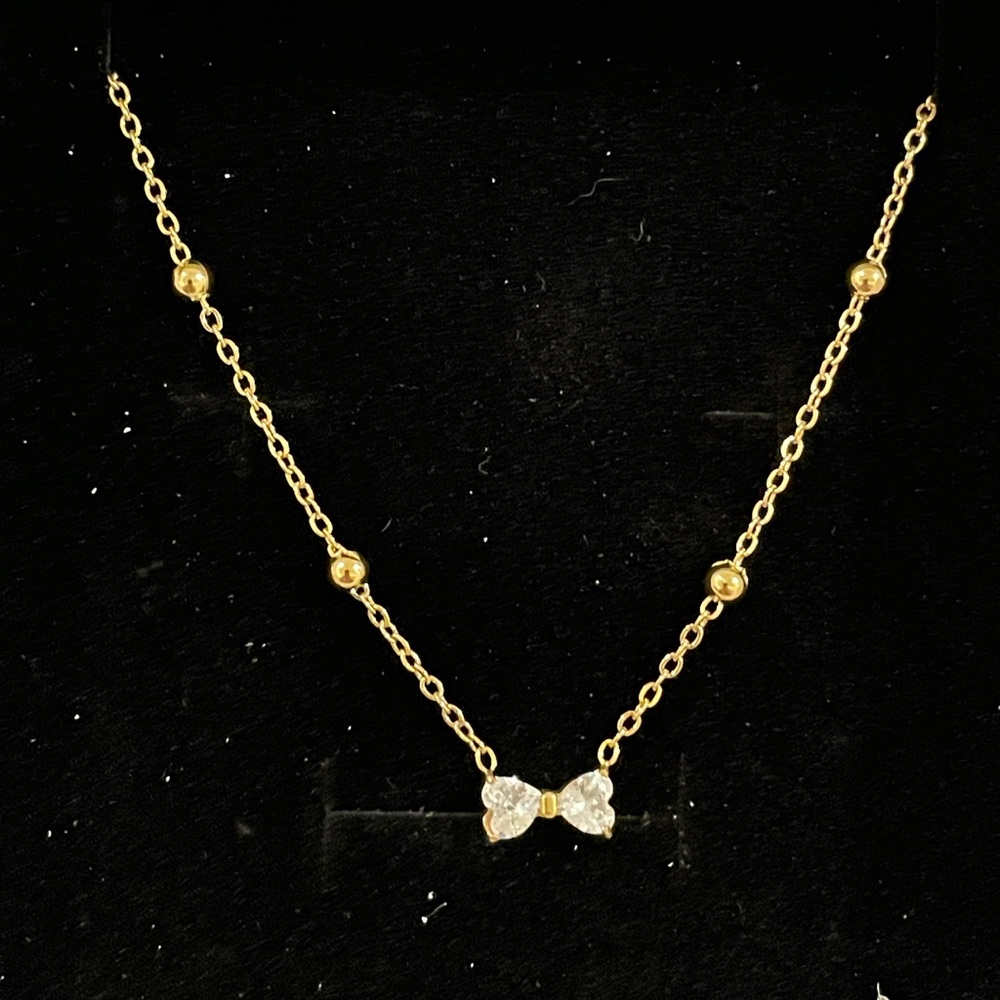 Elegant Gold Bow Necklace